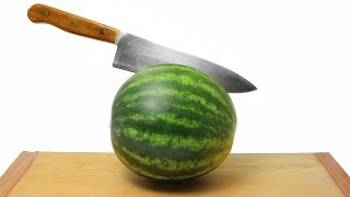 The Easiest Way to Cut a Watermelon  Rachael Ray Show [upl. by Aniat]