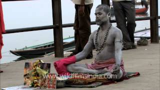 Sadhu baba at a puja on the ghats of Varanasi [upl. by Nauqad]