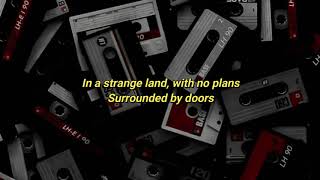 NIKI  Strange Land Lyrics  Acoustic Version [upl. by Etterb]