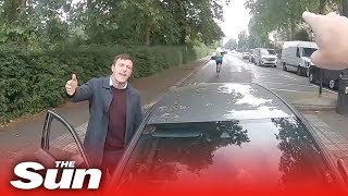 Motorist drives into vigilante cyclist as he stops driver on wrong side of road [upl. by Delcina]