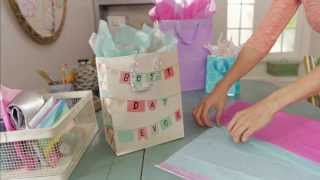 Giftology How to Fill a Gift Bag with Tissue [upl. by Animsaj379]