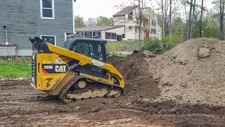 How To Spreading Top Soil With A Skidsteer [upl. by Rimhsak211]