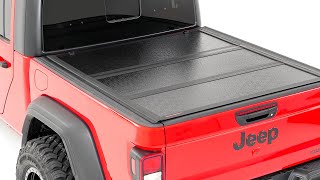 Installing Low Profile Hard Tri Fold Tonneau Cover by Rough Country [upl. by Aenehs]