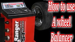 How to use a wheel balancer [upl. by Akinor632]