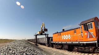 Straddle Excavator Unloading Gravel Railcars [upl. by Matthia519]