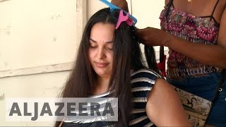 Venezuelan women sell hair to buy food [upl. by Lupita117]