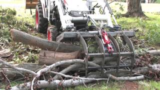 How To Use a Root Grapple On A Compact Utility Tractor [upl. by Marcellina]